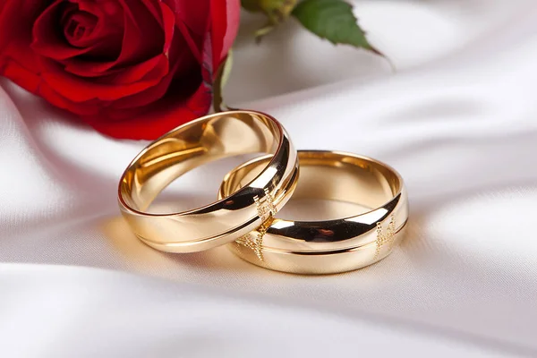 Wedding rings on a light background. High quality photo