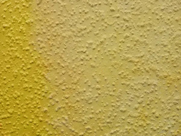 Bu canlı sarı duvar dokusu çarpıcı arka planlar, sanat projeleri ve tasarım elementleri için mükemmeldir.