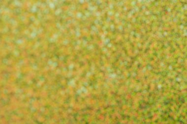 Altın parıltılı bu canlı soyut arka plan çeşitli yaratıcı projeler ve uygulamalar için idealdir.