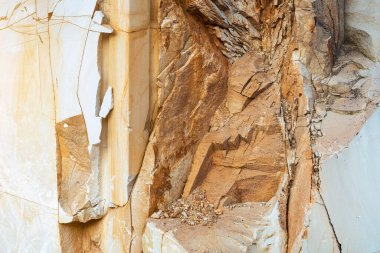 Crumbling sandstone stones, beautiful bright rocks, stone texture