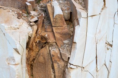 Texture of cracked stone in orange color