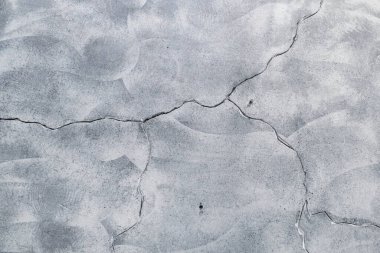 Çatlaklarda gri beton zemin, çimento öğütme