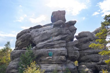 Large hanging stone rocks in the tourist place Szczeliniec wielki, Poland