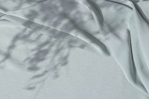 Textura Tecido Azul Claro Com Dobras Sombras Naturais Luz Solar — Fotografia de Stock