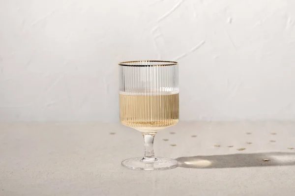 Minimal New Year Celebration Concept One Wineglass Sparkling Wine Beige — Stock Photo, Image