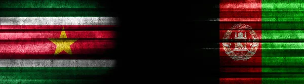 Banderas Surinam Afganistán Sobre Fondo Negro —  Fotos de Stock