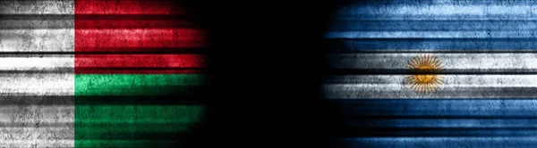 马达加斯加和阿根廷黑色背景旗 — 图库照片