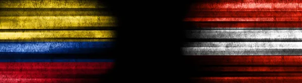 Σημαίες Κολομβίας Και Αυστρίας Μαύρο Φόντο — Φωτογραφία Αρχείου