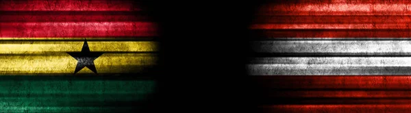 Ghana Und Österreich Fahnen Auf Schwarzem Hintergrund — Stockfoto