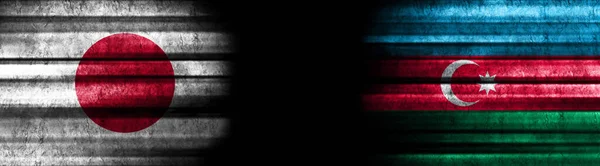 Japan and Azerbaijan Flags on Black Background