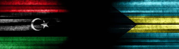 Libië Bahama Vlaggen Zwarte Achtergrond — Stockfoto