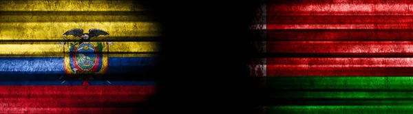 エクアドルとベラルーシの黒い背景の旗 — ストック写真