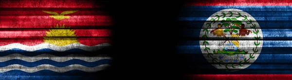 黒い背景のキリバスとベリーズの旗 — ストック写真