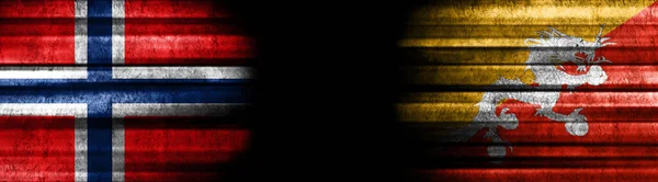 Bandeiras Noruega Butão Sobre Fundo Preto — Fotografia de Stock