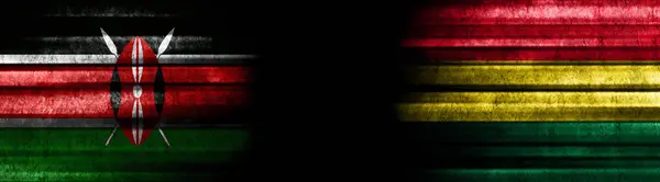 ケニアとボリビア 黒い背景の旗 — ストック写真