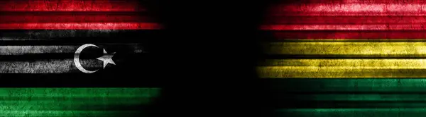 Libyen Und Bolivien Fahnen Auf Schwarzem Hintergrund — Stockfoto