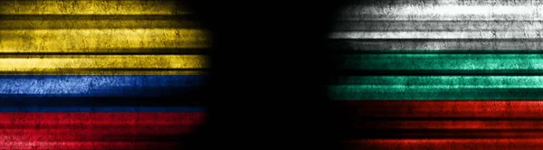 ブラックバックグラウンドのコロンビアとブルガリアの旗 — ストック写真