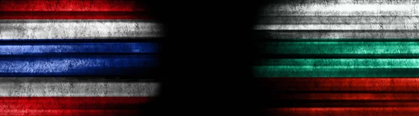Thailand and Bulgaria Flags on Black Background