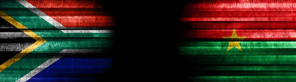 Südafrika Und Burkina Faso Fahnen Auf Schwarzem Hintergrund — Stockfoto