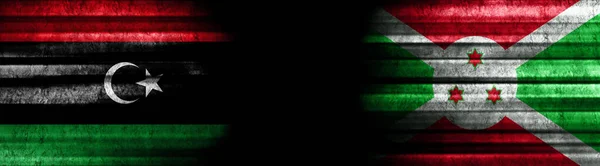 Líbia Burundi Bandeiras Fundo Preto — Fotografia de Stock