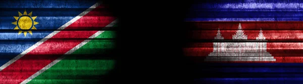 Namibie Kambodža Vlajky Černém Pozadí — Stock fotografie