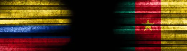 哥伦比亚和喀麦隆黑色背景旗帜 — 图库照片