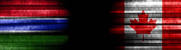 Gambia Und Kanada Fahnen Auf Schwarzem Hintergrund — Stockfoto