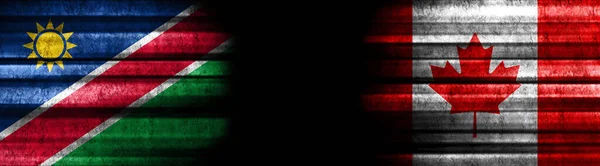 Flaggen Namibias Und Kanadas Auf Schwarzem Hintergrund — Stockfoto