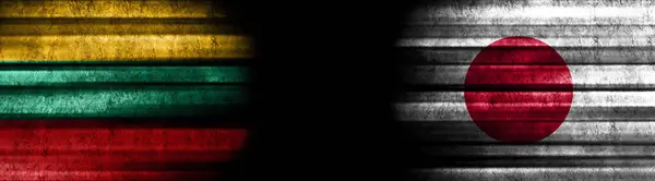 Lithuania and Japan Flags on Black Background