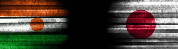 Σημαίες Του Νίγηρα Και Της Ιαπωνίας Μαύρο Φόντο — Φωτογραφία Αρχείου