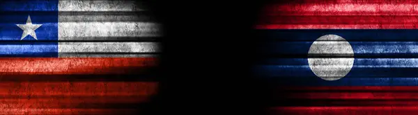 Chile Und Laos Flaggen Auf Schwarzem Hintergrund — Stockfoto