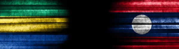 Флаги Габона Лаоса Чёрном Фоне — стоковое фото