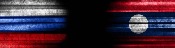 Σημαίες Ρωσίας Και Λάος Μαύρο Φόντο — Φωτογραφία Αρχείου