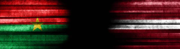 Burkina Faso Letônia Bandeiras Fundo Preto — Fotografia de Stock