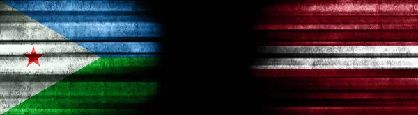 Flaggen Von Dschibuti Und Lettland Auf Schwarzem Hintergrund — Stockfoto