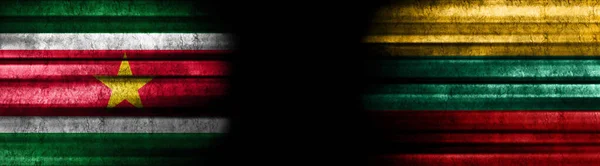 苏里南和立陶宛黑色背景旗 — 图库照片