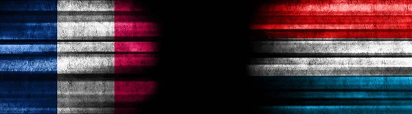 France and Luxembourg Flags on Black Background
