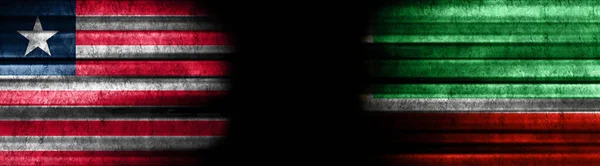 Liberia Und Tschetschenien Fahnen Auf Schwarzem Hintergrund — Stockfoto
