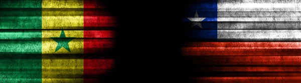 塞内加尔和智利黑色背景旗 — 图库照片