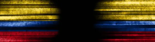 Colombia and Colombia Flags on Black Background