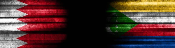 巴林和科摩罗黑色背景旗 — 图库照片