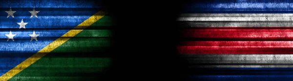 Solomon Islands and Costa Rica Flags on Black Background