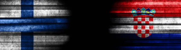 Finland and Croatia Flags on Black Background