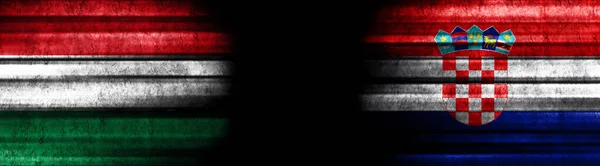 匈牙利和克罗地亚关于黑人背景的旗帜 — 图库照片