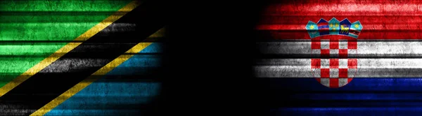 Tanzania and Croatia Flags on Black Background