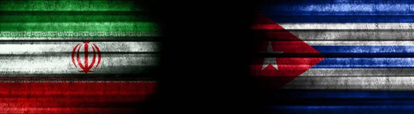 Iran and Cuba Flags on Black Background