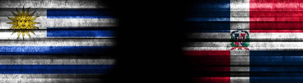 Uruguay and Dominican Republic Flags on Black Background