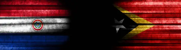 Flaggen Paraguays Und Osttimors Auf Schwarzem Hintergrund — Stockfoto