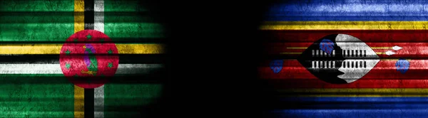 Dominica Und Swatini Flaggen Auf Schwarzem Hintergrund — Stockfoto