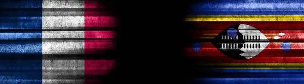 France and Eswatini Flags on Black Background